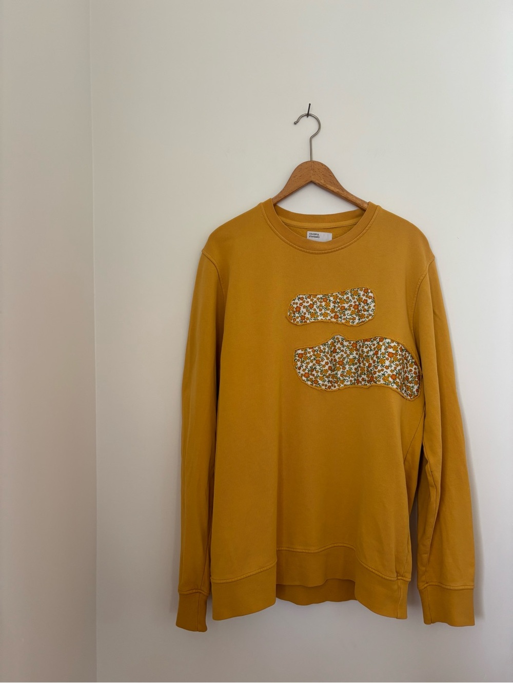 Colorful Standard oversized crew in marigold upcycled with floral patches
